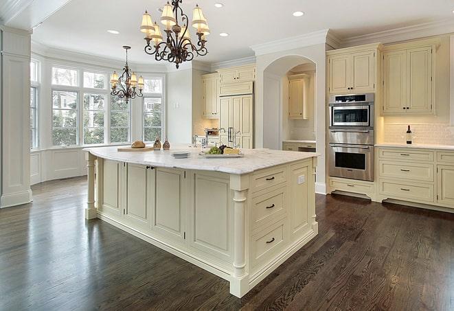 refinished laminate floors with glossy finish in College Point